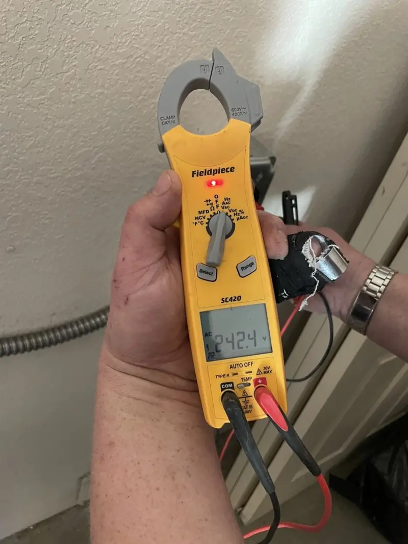 Voltage testing with clamp meter during Generator Installation in Stanford